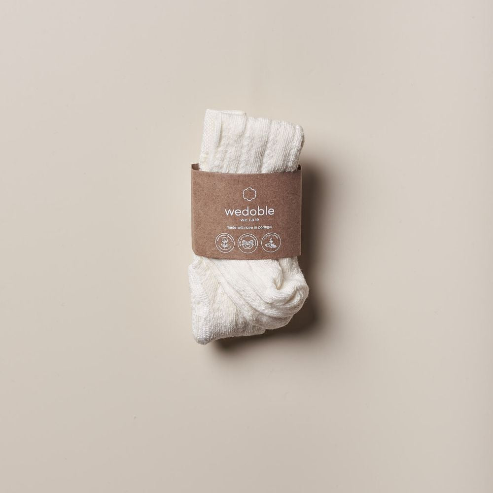 Collants de malha com design crochet para bebé | WINTER STORIES - Wedoble