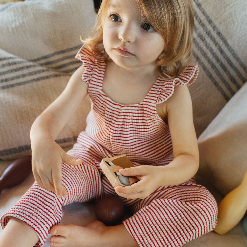 Macacão malha de riscas - Laranjinha